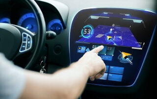 person fidgeting with dash computer